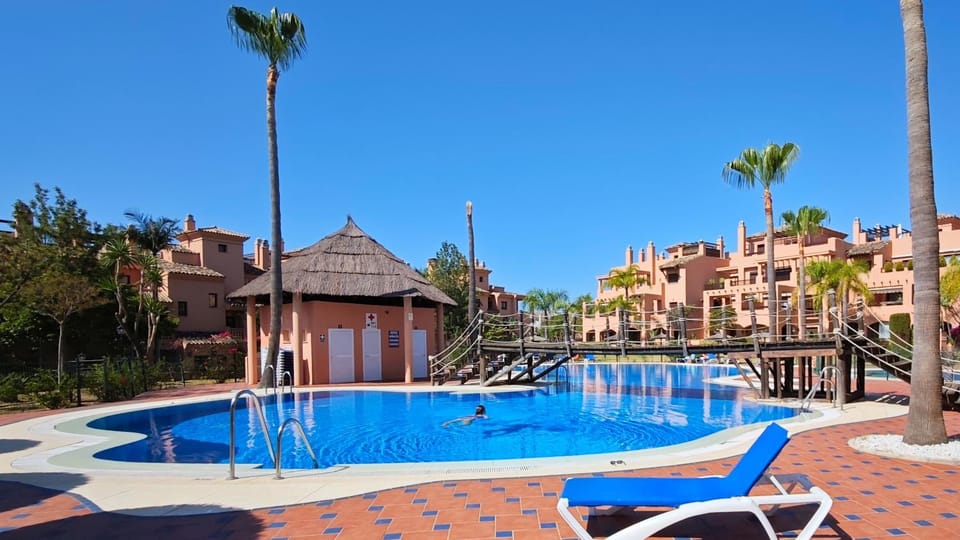 Swimming pool, sunbed