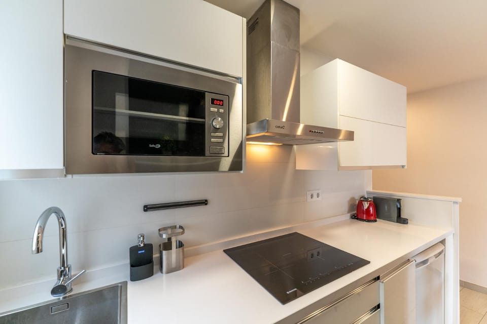 Kitchen or kitchenette, stove, toaster