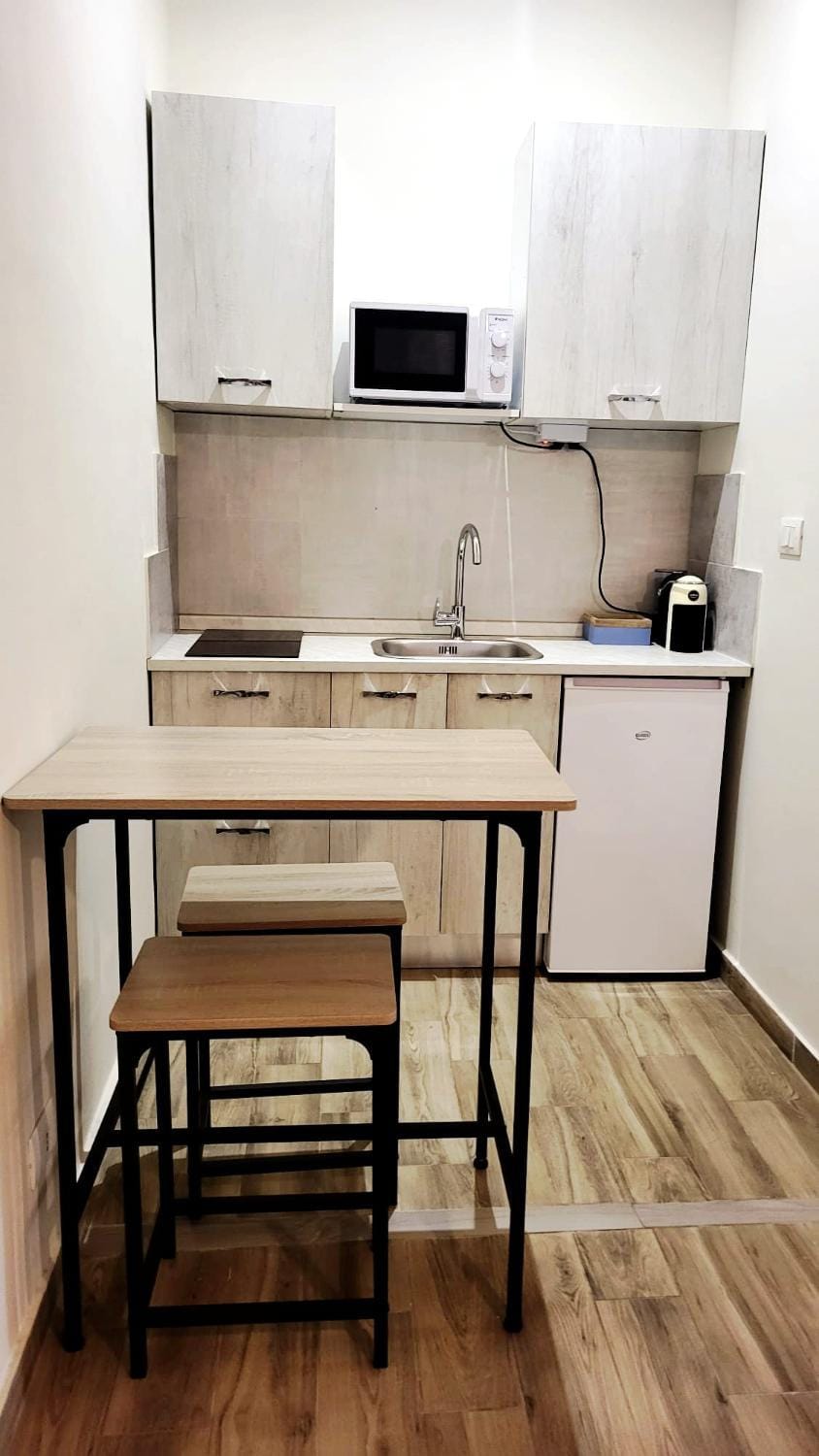 Kitchen or kitchenette, stove