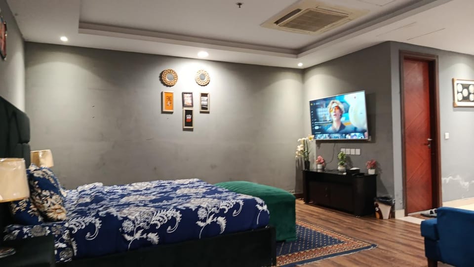 One Bed suit Work Desk Balcony & Private compert Apartment in Lahore