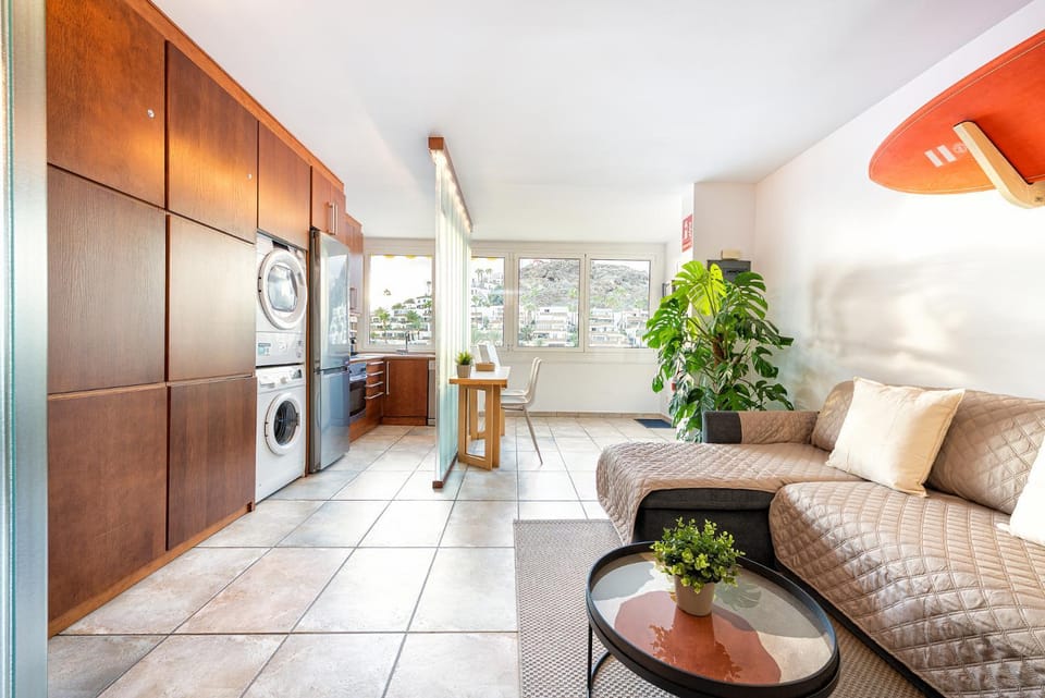 Kitchen or kitchenette, Living room, dishwasher, microwave, oven, stove, toaster, washing machine, dryer