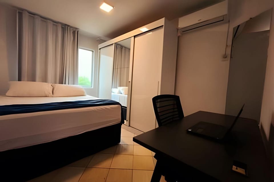 Apartamento 700m da praia, com kit praia, estacionamento e ar condicionado Apartment in Florianopolis