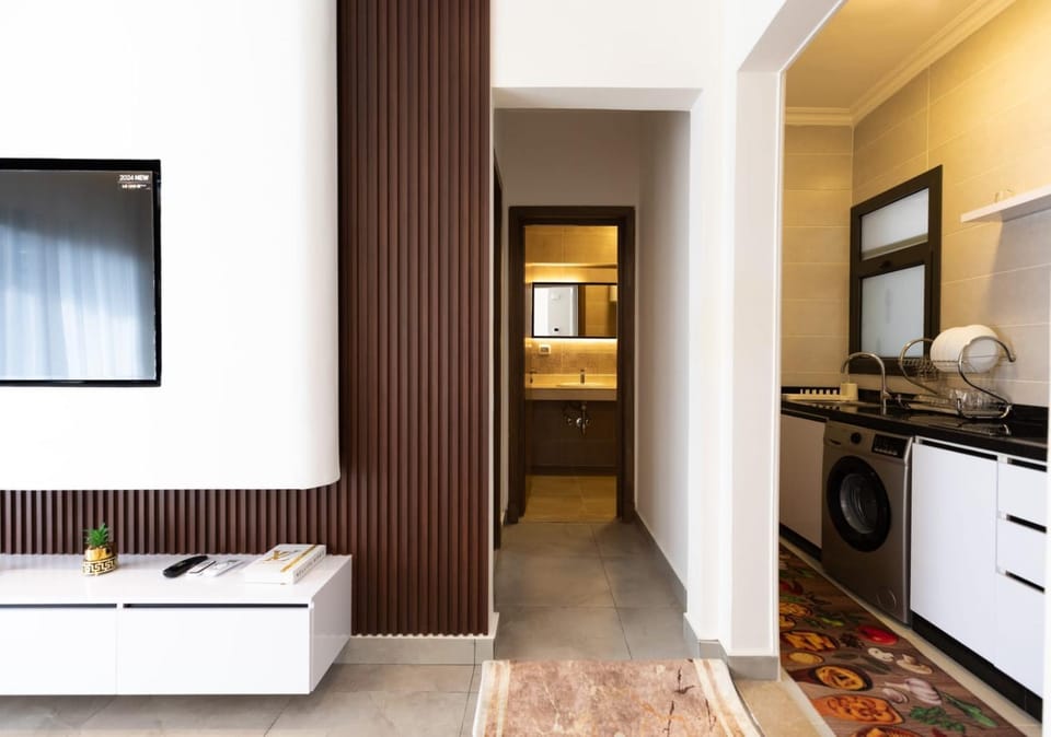 Kitchen or kitchenette, washing machine