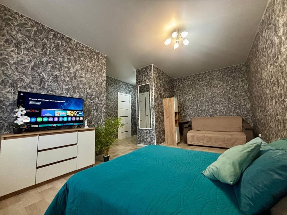 Квартира с большим телевизором СМАРТ Apartment in Kazakhstan