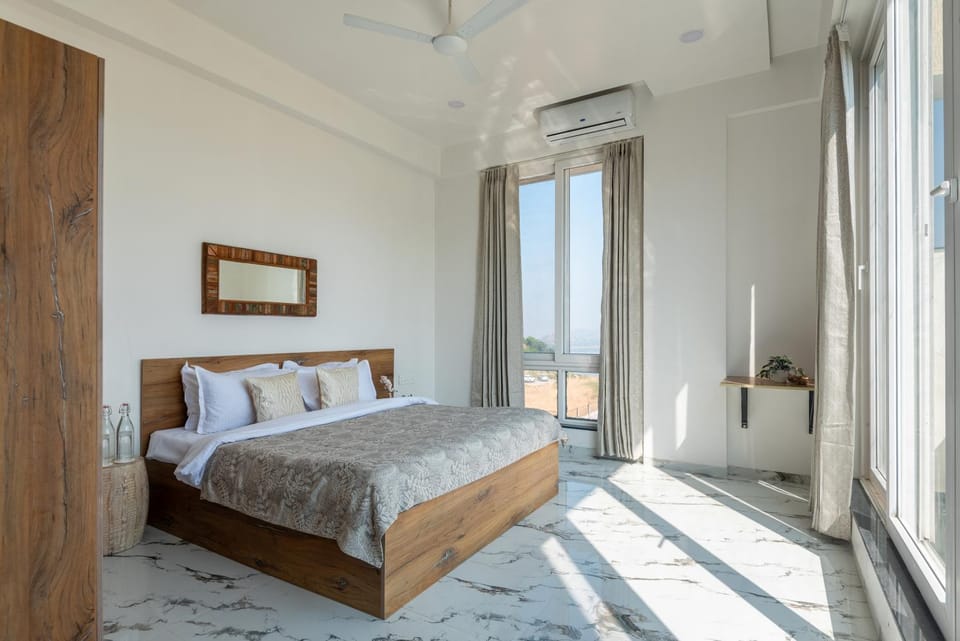 ELIVAAS Signature White House 4-BHK Villa with Panoramic Hill Views, Glass Room, Outdoor Pool & Dam nearby Villa in Maharashtra