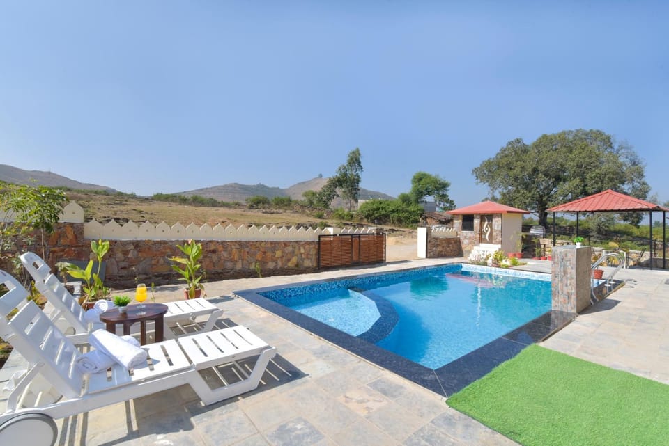 Alaya Stays Colonel Retreat 3 BHK Hideaway with Private Pool & Gardens Near Ubeshwar Mahadev Temple Villa in Gujarat