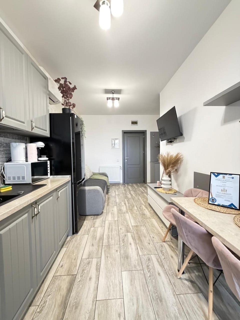 Living room, microwave, oven, kitchen