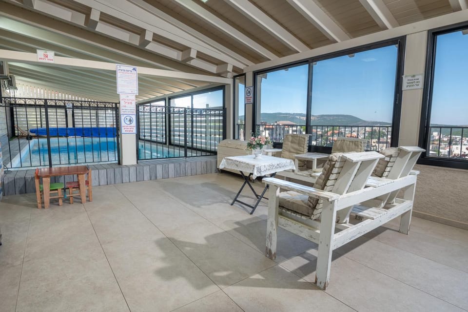 View (from property/room), Balcony/Terrace, Pool view, Swimming pool, sunbed