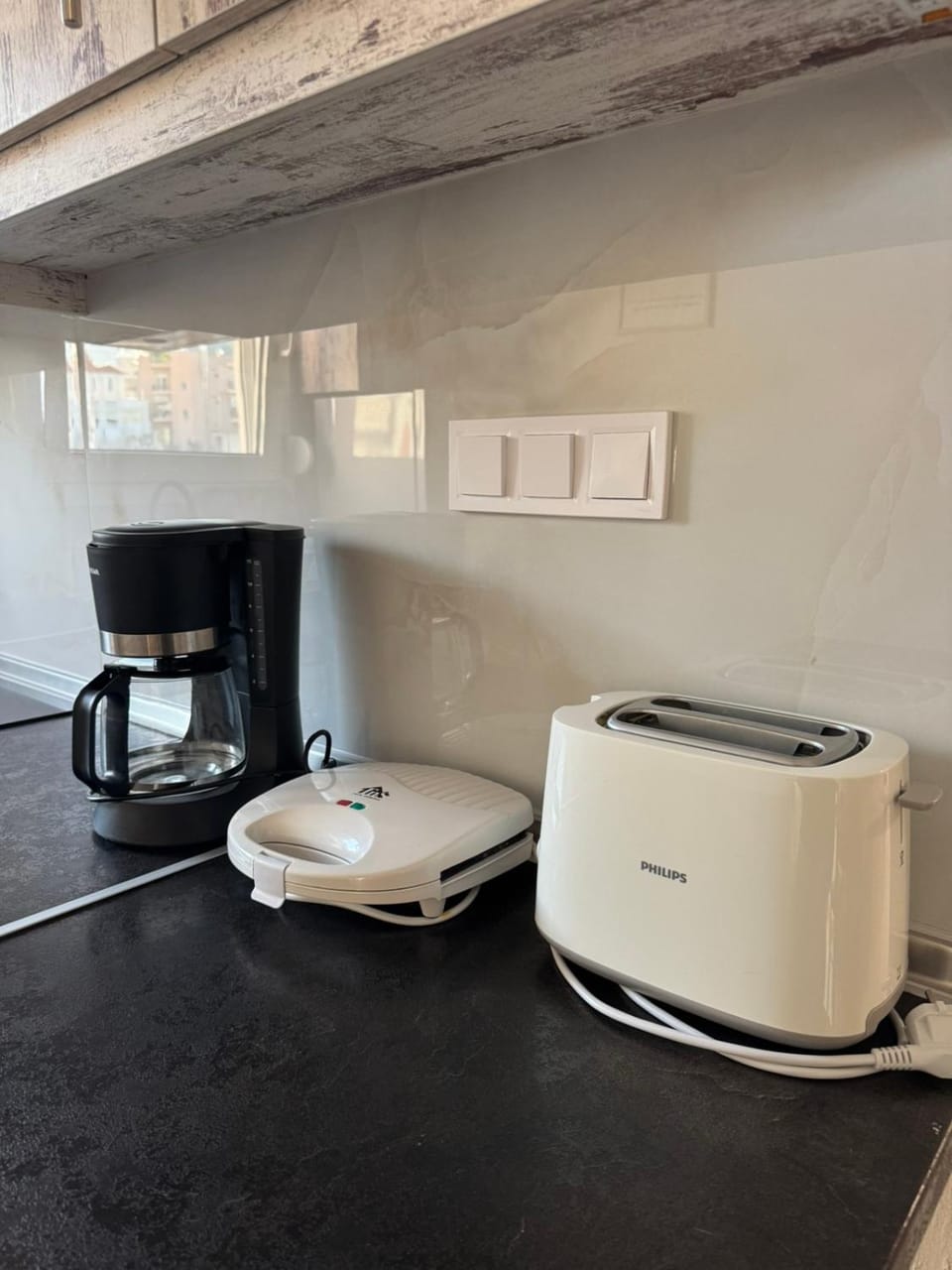 Kitchen or kitchenette, toaster
