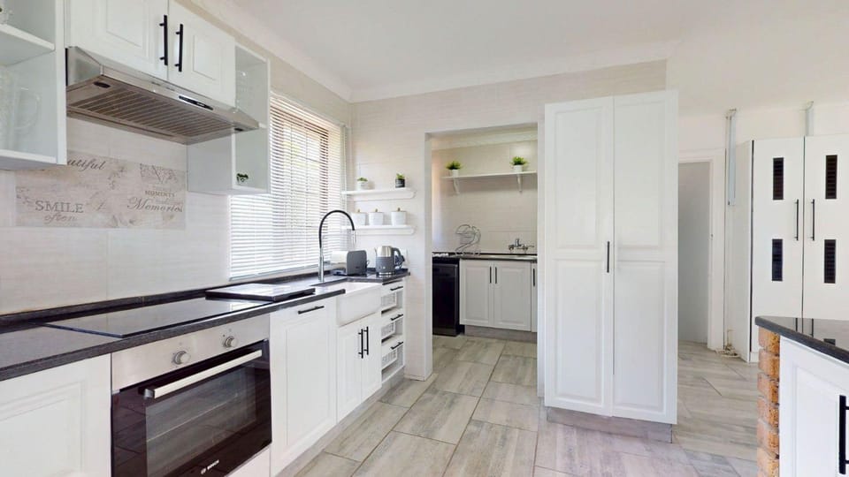 Kitchen or kitchenette, oven, stove, toaster
