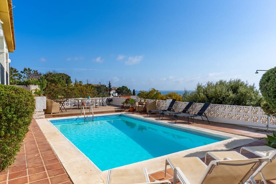 Property building, Living room, Swimming pool