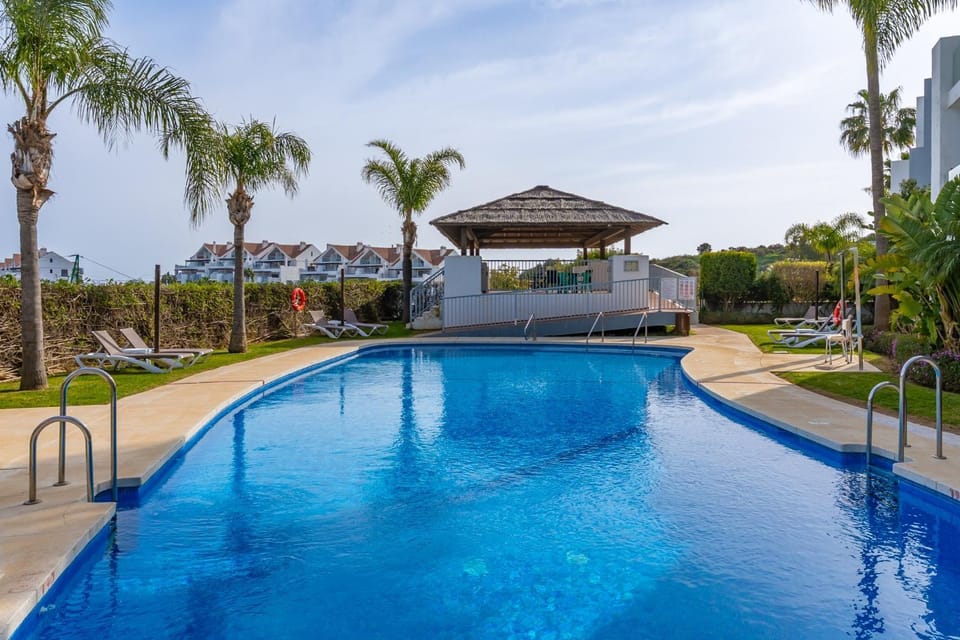 Property building, Living room, Swimming pool