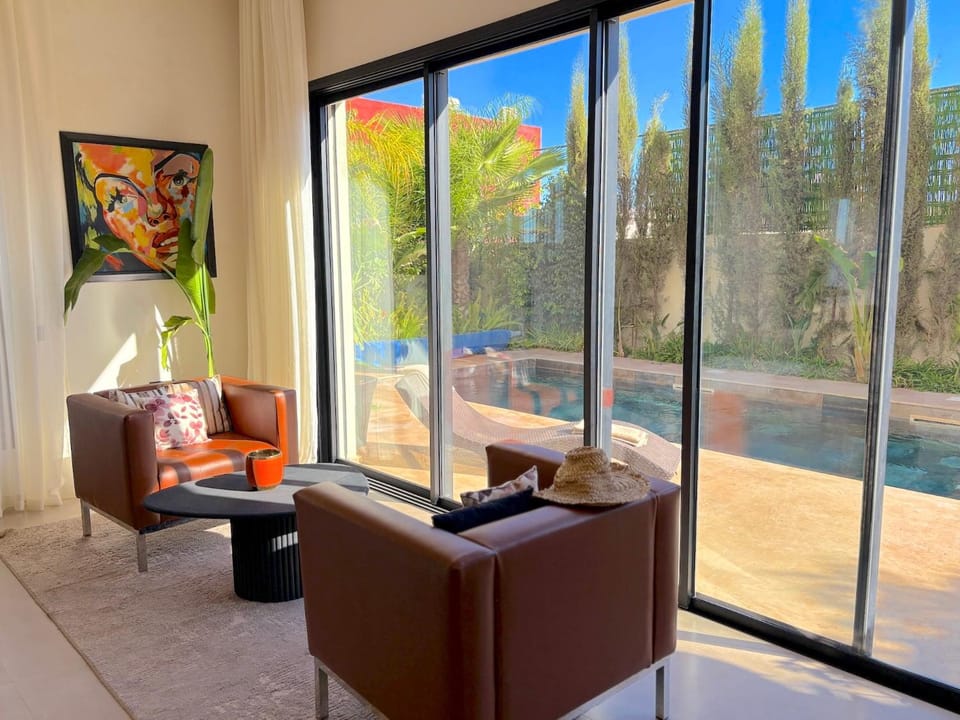 Patio, Garden, Living room, Seating area, Garden view, Pool view, Swimming pool, sunbed