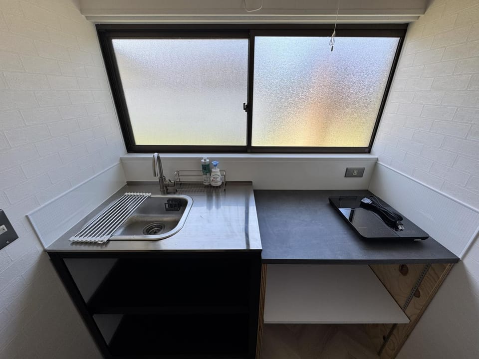 Kitchen or kitchenette, stove