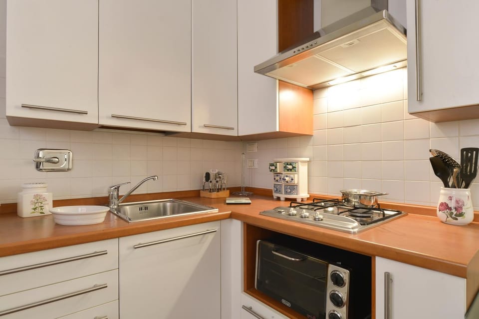 Kitchen or kitchenette, stove