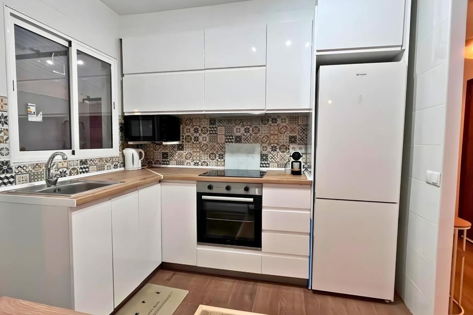 Kitchen or kitchenette, oven, stove