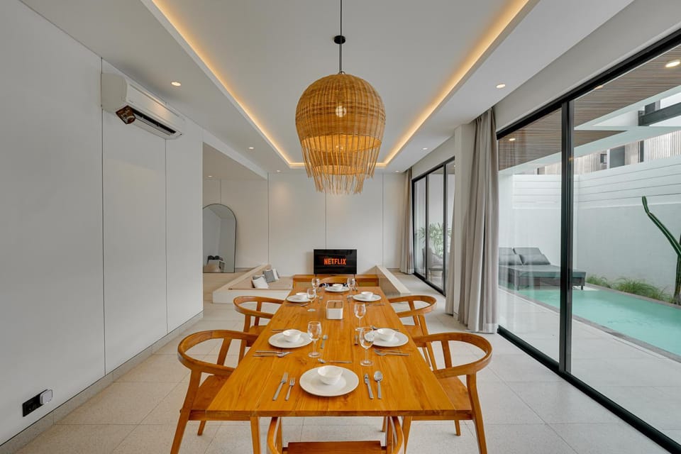Living room, Seating area, Dining area, Pool view