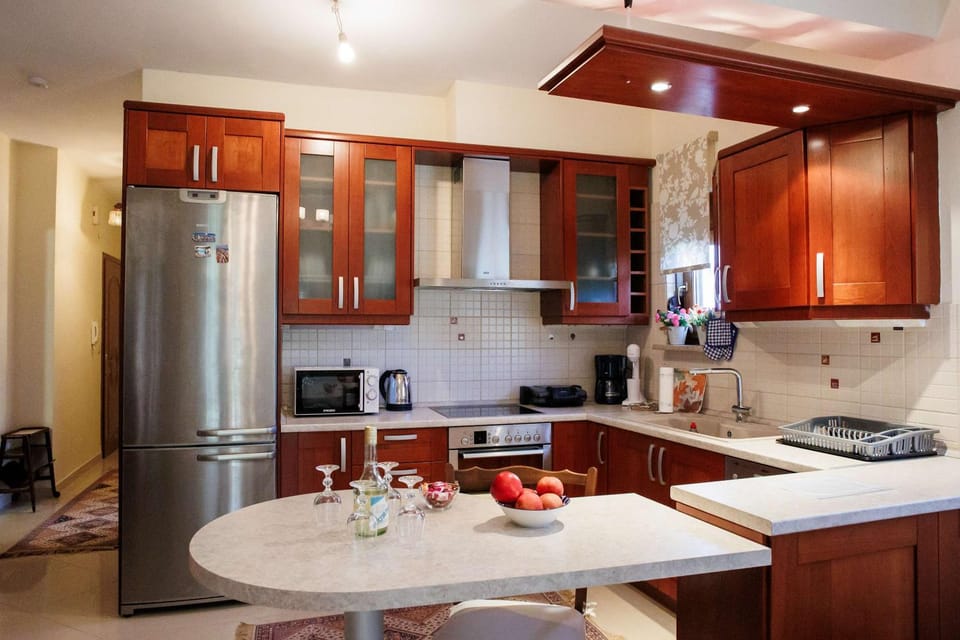 Kitchen or kitchenette, dishwasher, oven, stove, toaster