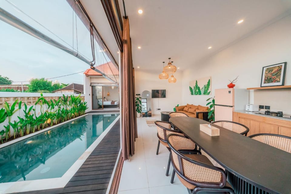 Living room, Seating area, Pool view