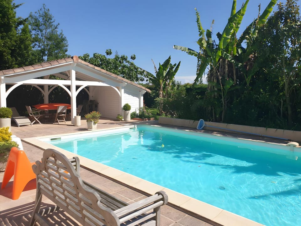 Property building, Living room, Swimming pool