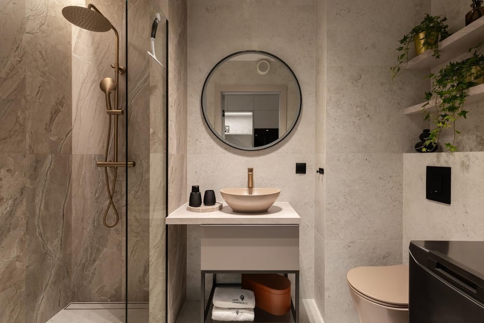 Shower, Bathroom, hair dryier, towels, laundry