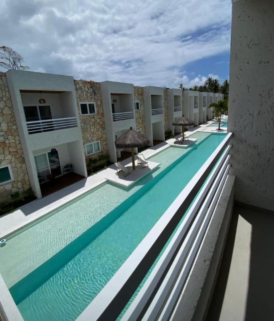 Property building, Day, View (from property/room), Balcony/Terrace, Pool view, Swimming pool, sunbed