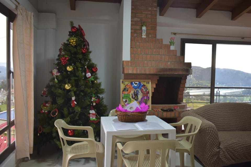 Game Room, View (from property/room), Living room, Seating area, Mountain view