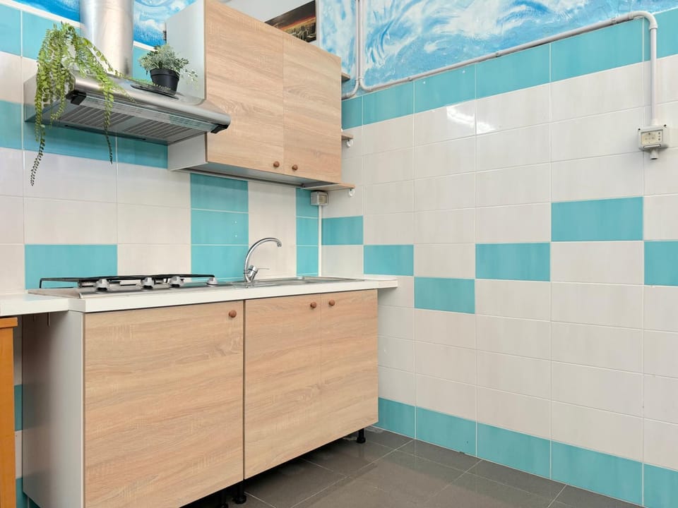 Kitchen or kitchenette, stove