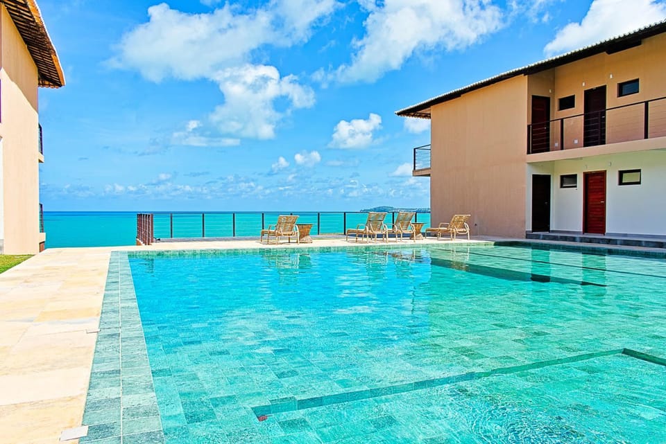 Property building, Patio, Day, Natural landscape, Pool view, Sea view, Swimming pool, sunbed