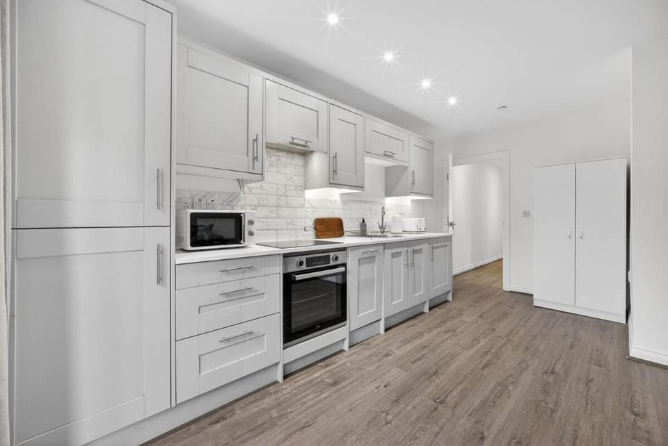 Kitchen or kitchenette, oven, stove