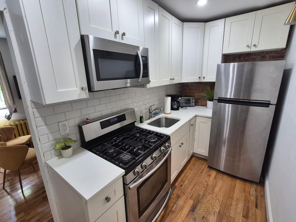 Kitchen or kitchenette, oven, stove, toaster