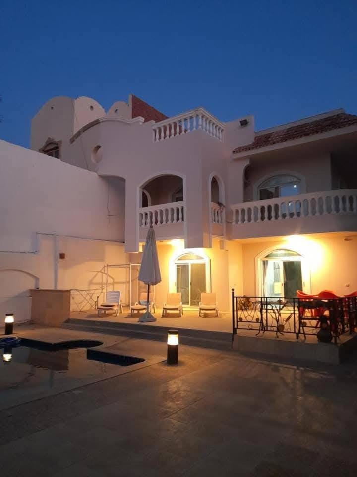 Property building, Patio, Night, View (from property/room), Balcony/Terrace, Pool view, Swimming pool