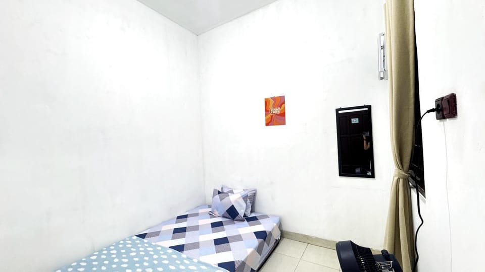 Homey Guesthouse Gubeng Syariah Vacation rental in Surabaya