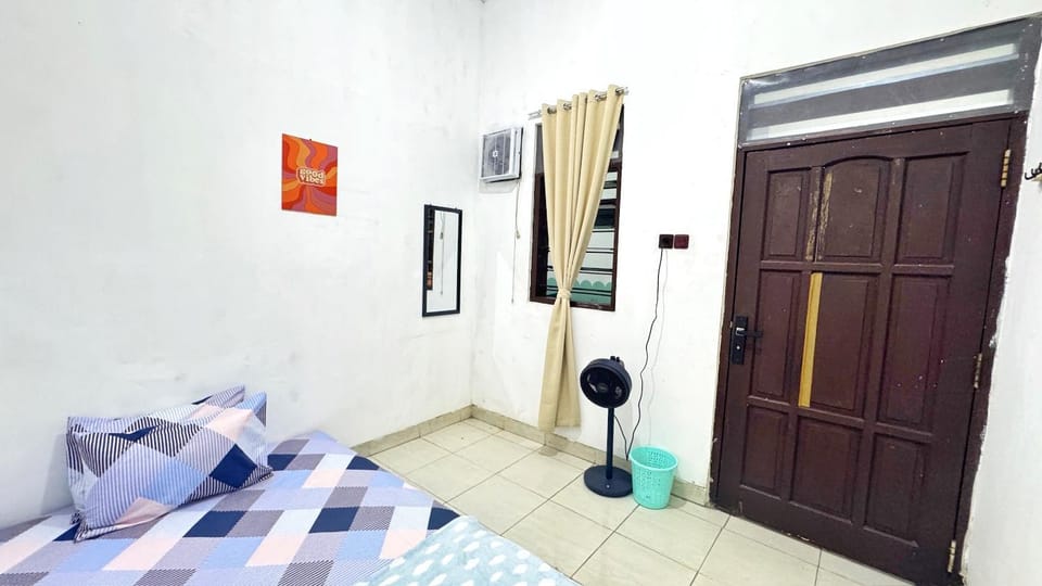 Homey Guesthouse Gubeng Syariah Vacation rental in Surabaya