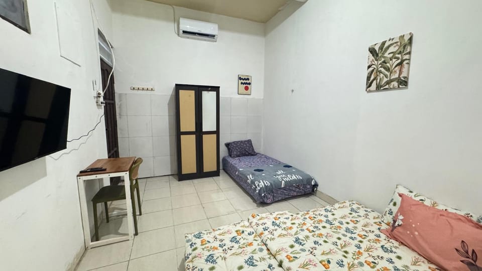 Homey Guesthouse Gubeng Syariah Vacation rental in Surabaya