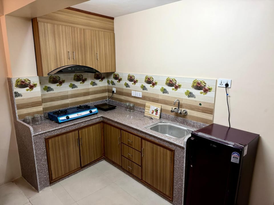 Kitchen or kitchenette, stove