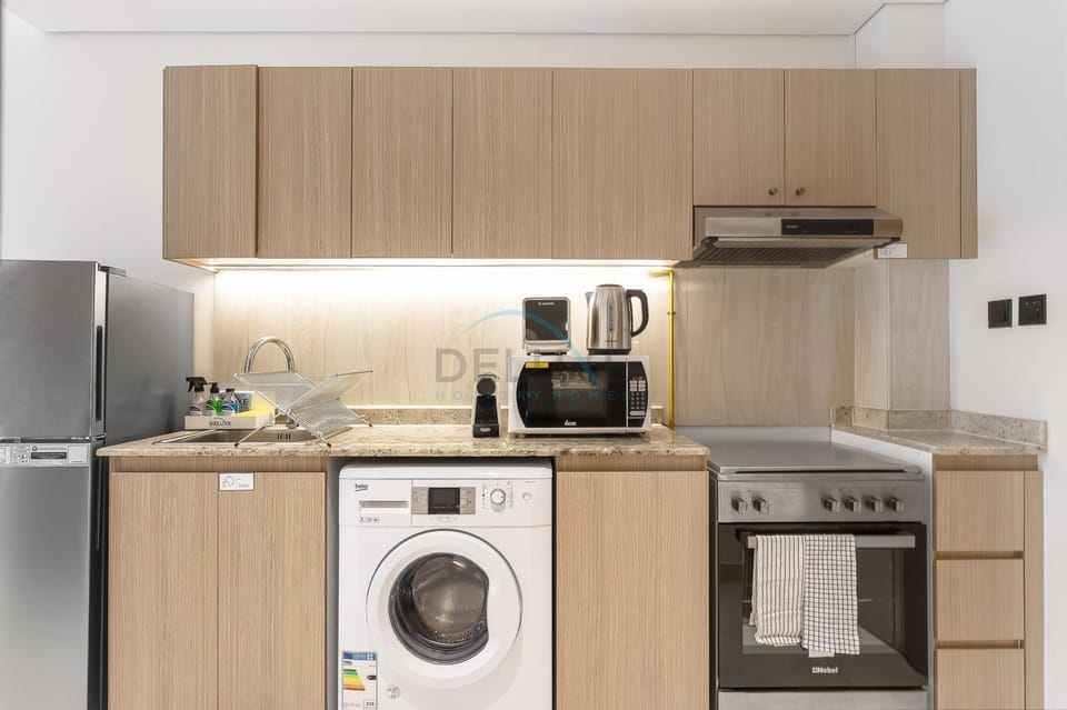 microwave, oven, stove, toaster, washing machine, kitchen