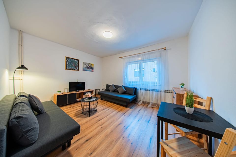 Property building, TV and multimedia, Living room, Seating area, Dining area