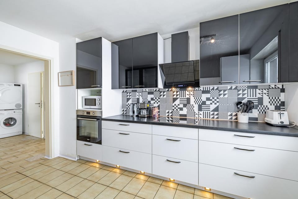 Kitchen or kitchenette, oven