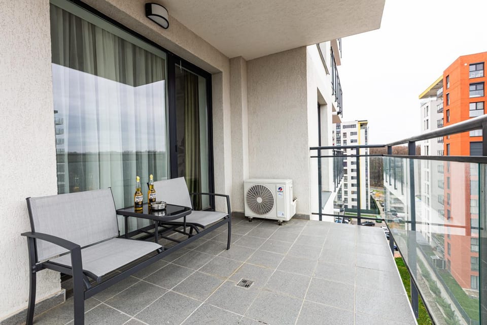 Property building, Patio, Day, View (from property/room), Balcony/Terrace, Living room, Seating area, air conditioner