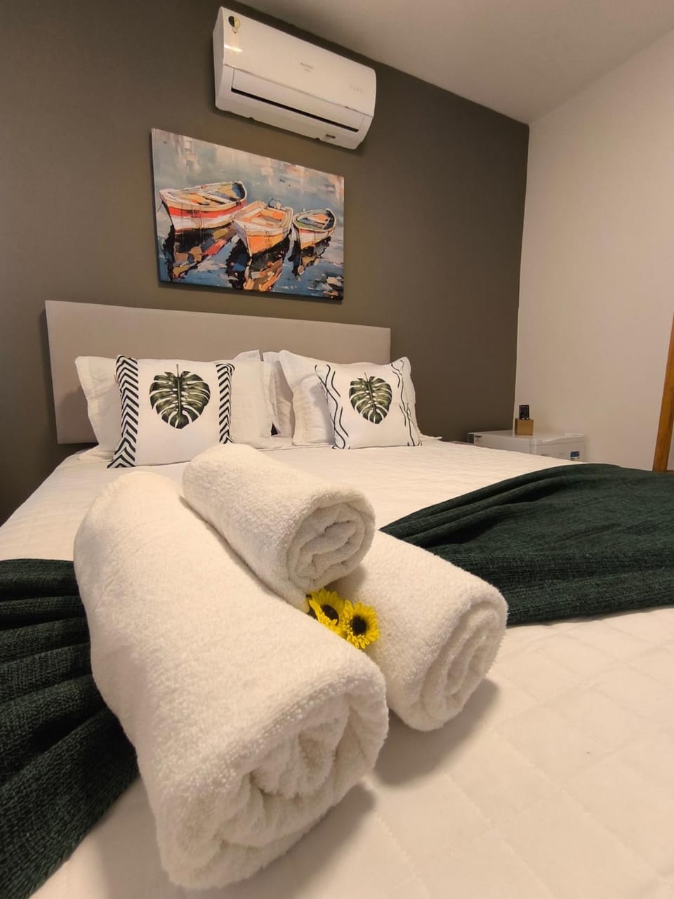 Bed, Photo of the whole room, Bedroom, towels, air conditioner