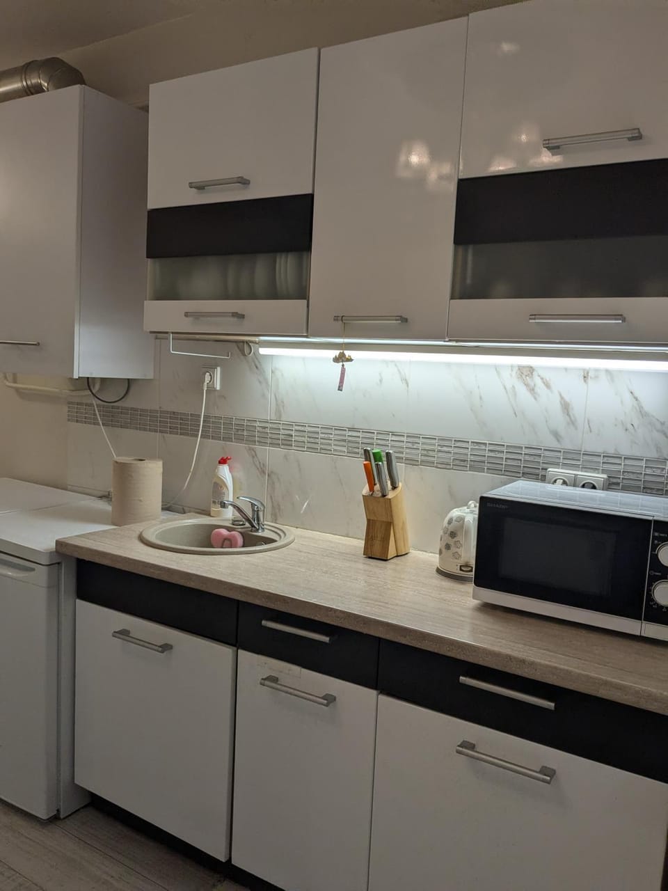Kitchen or kitchenette, microwave