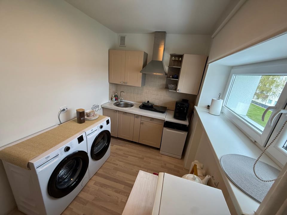 Kitchen or kitchenette, dishwasher, washing machine, dryer
