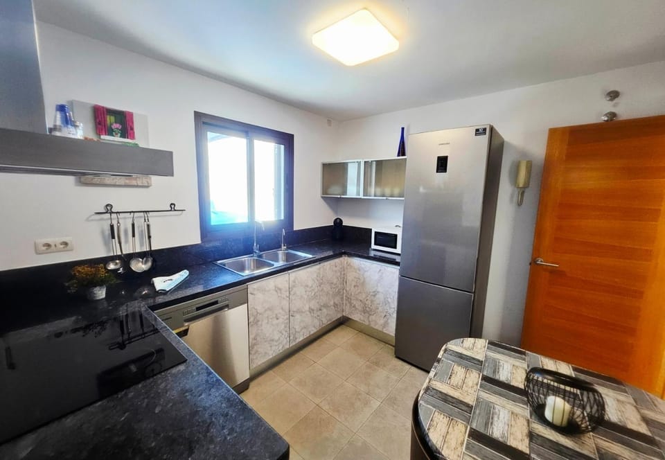 Kitchen or kitchenette, Dining area, dishwasher, stove, toaster