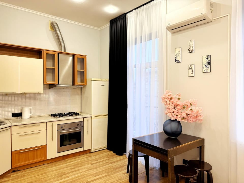 Kitchen or kitchenette, oven, stove, air conditioner