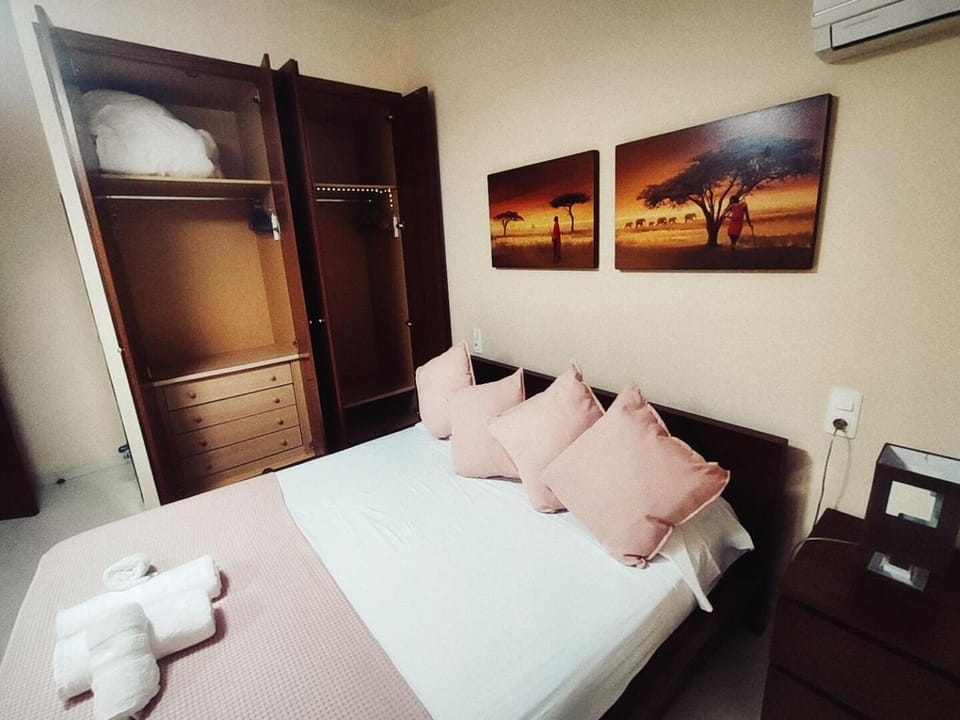 Bed, Bedroom, towels, wardrobe, air conditioner