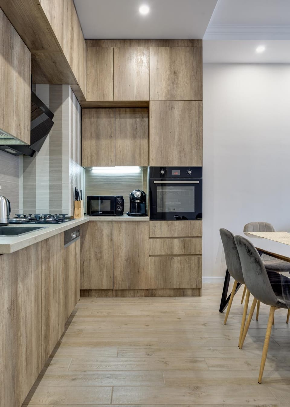 Kitchen or kitchenette, microwave, oven, stove