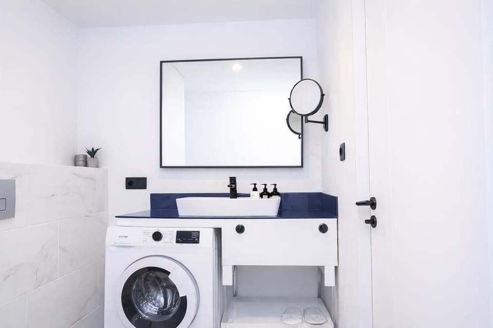 Bathroom, towels, washing machine, dryer