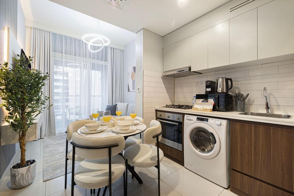 Kitchen or kitchenette, Seating area, Dining area, oven, stove, washing machine