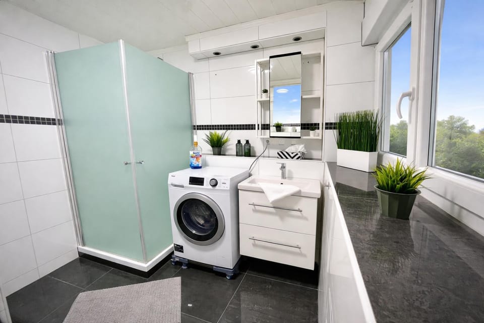 Shower, towels, washing machine